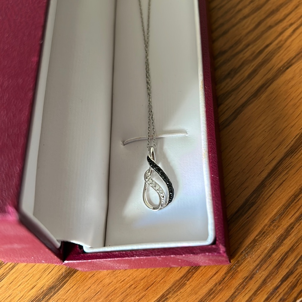 New with box, diamond and black diamond with chain